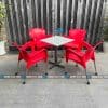 Bộ bàn ghế cafe nhựa đúc chân inox nữ hoàng màu đỏ.
