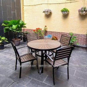 Bàn ghế nhựa giả gỗ ngoài trời bộ 1 bàn tròn 80cm 4 ghế tay cong