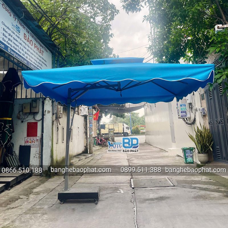 Dù Lệch Tâm Vuông 3m Màu Xanh Nước Biển 13 Dù lệch tâm vuông 3m màu xanh nước biển với kết cấu vững chãi và độ bền cao