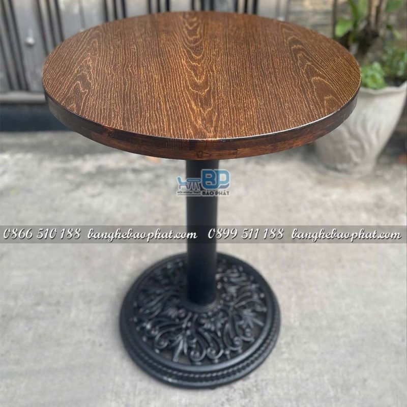 Bàn Cafe Chân Gang Đúc Hoa Văn Mặt Gỗ Cạnh Dày 34mm 13 Bàn cafe chân gang đúc hoa văn mặt gỗ cạnh dày 34mm độ bền cao