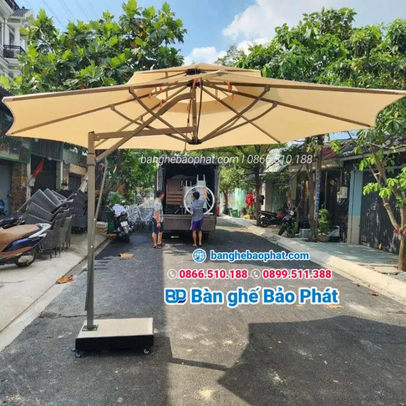 Cần bẩy trợ lực của dù che nắng là gì?