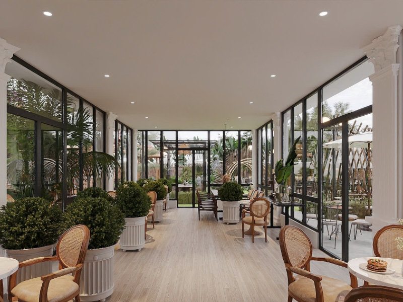 Mẫu thiết kế quán cafe 80m2 sang trọng với ghế gỗ bọc nệm ngồi lưng mây
