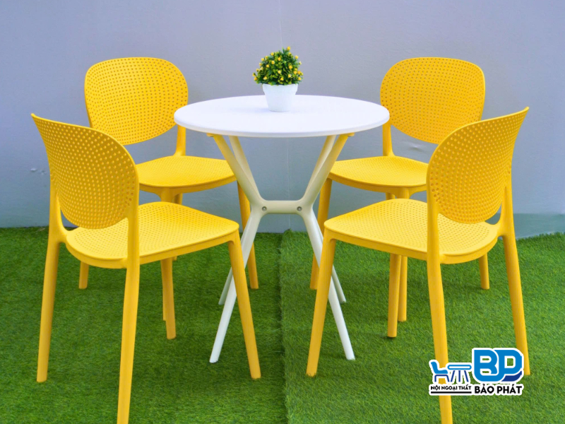 Bộ ghế nhựa cafe chân sắt TB màu vàng kết hợp bàn tròn hiện đại