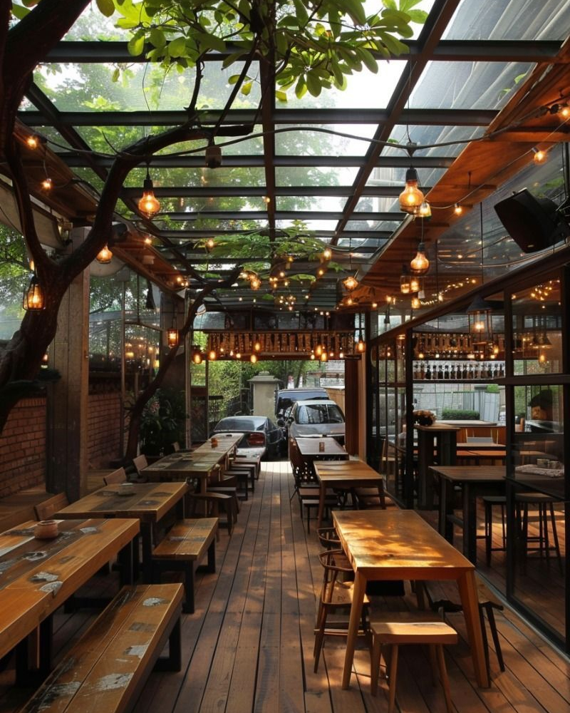 Mẫu thiết kế quán cafe Hàn Quốc khung kính giếng trời và cây xanh
